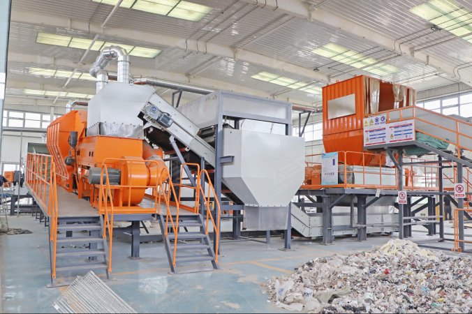 Progetto di smistamento e smaltimento dei rifiuti tessili mediante vagliatura pneumatica nella provincia di Henan, Cina